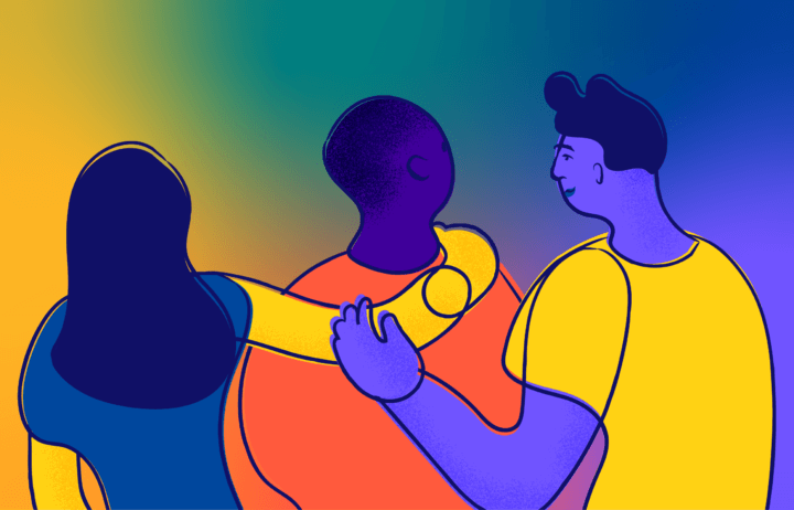 3 individuals standing shoulders to shoulders supporting each other