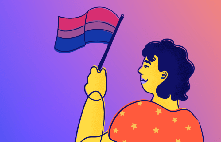 Young person holding the Bi+ Flag